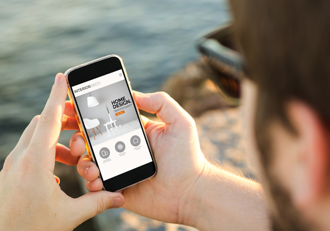 man looking at mobile website design